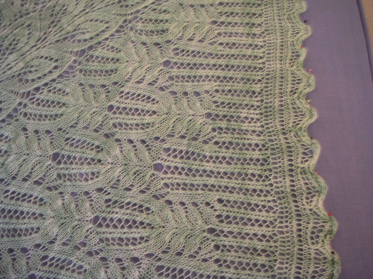 A blocked lace fabric with an open, even pattern