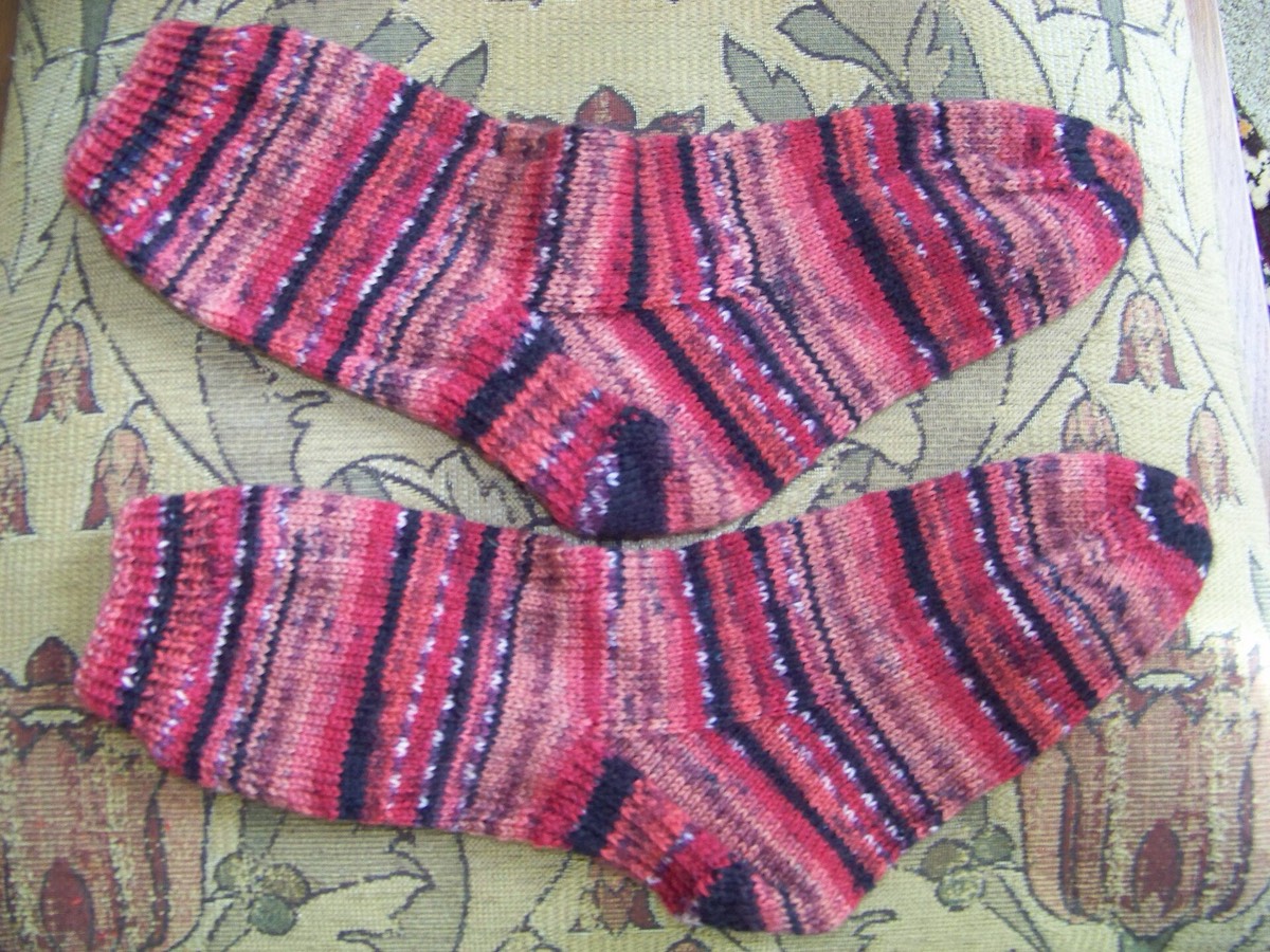 Hand-knitted socks made with self-striping yarn