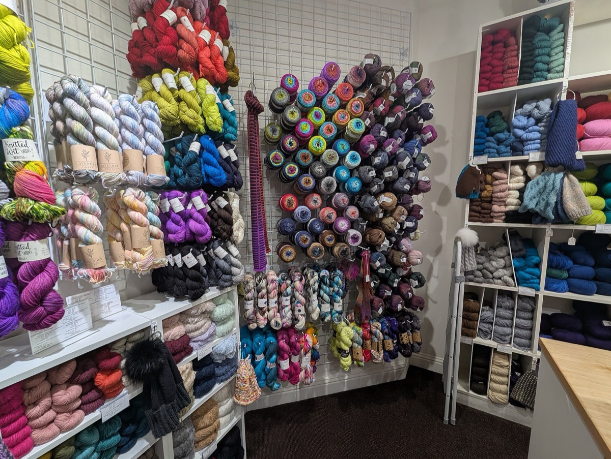 Shelves of yarn in a yarn shop